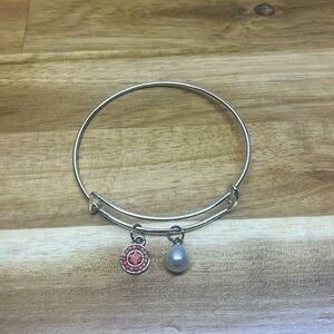 silver adjustable bangle with pearl and pink beaded charms